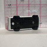 White #4 Triumph TRG 2009 Hot Wheels Diecast Car