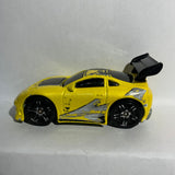 Yellow Toyota Supra Tooned Hot Wheels Diecast Car