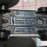 White #4 Triumph TRG 2009 Hot Wheels Diecast Car