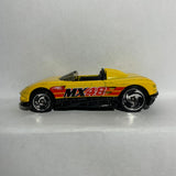 Yellow MX48 Turbo Hot Wheels Diecast Car