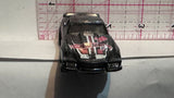 Black #10 Blvd Bruiser T9704 ©2010 Hot Wheels Diecast Car