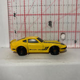 Yellow Nissan Fairlady Z Hot Wheels Diecast Car