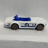White #4 Triumph TRG 2009 Hot Wheels Diecast Car