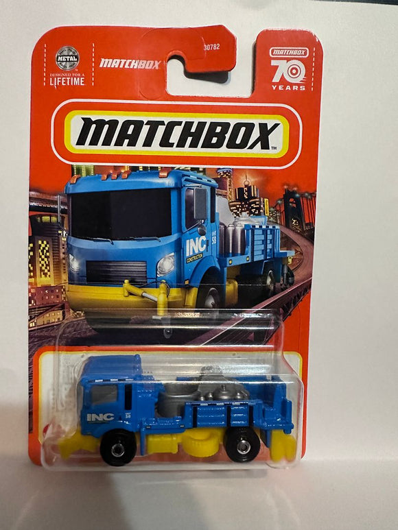 Blue Road Stripe King INC Construction 55/100 70 Years HKW81 ©2022 Matchbox Diecast Car