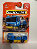 Blue Road Stripe King INC Construction 55/100 70 Years HKW81 ©2022 Matchbox Diecast Car