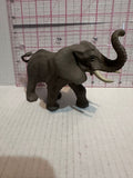 Grey Elephant Trunk Raised ©2003 Safari Animal Toy