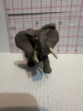 Grey Elephant Trunk Raised ©2003 Safari Animal Toy