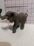 Grey Elephant Trunk Raised ©2003 Safari Animal Toy