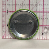 Calgary Sun & Lammle's Western Wear Green Smiling Face  Button Pinback