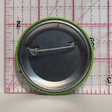 Calgary Sun & Lammle's Western Wear Green Smiling Face  Button Pinback