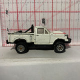 White '87 Ford F-150 Flaeside Dust Devil Truck Maisto Diecast Car