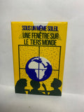 Sous un Meme Soleil une Fanetre sur le tiers Monde  Button Pinback