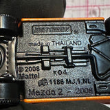 Orange Mazda 2 2008  Matchbox Diecast Car