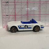 White #4 Triumph TRG 2009 Hot Wheels Diecast Car