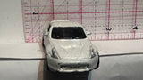 Silver 2009 Nissan 370 Maisto Diecast Car
