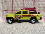 Yellow Beach Patrol Toyota Tacoma BDV65 Matchbox Diecast Car