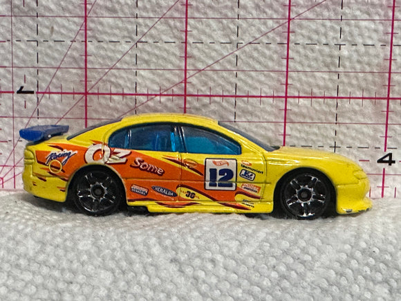 Yellow SS Commodore VT 2000 Hot Wheels Diecast Car