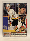 #227 Jyrki Lumme Vancouver Canucks 1994-95 Fleer Ultra Hockey Card