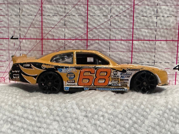 Yellow #68 '10 Chevy Impala 2010 Hot Wheels Diecast Car