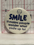 Smile it makes people wonder what you're up to Button Pinback