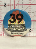 39 and holding cake Button Pinback