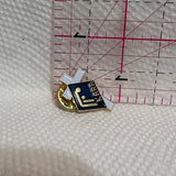 Kara Logo Cross  Lapel Pin