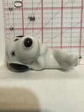 White Dog Black Ears Laying Down Figurine Ornament