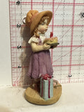 Little Girl Holding a Birthday Cake Figurine Ornament