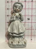 Lady Sitting on a Fence Figurine Ornament