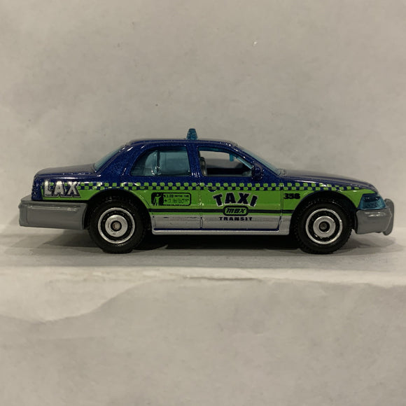 Blue Taxi 2006 Ford Crown Victoria ©2005 Matchbox Diecast Car ED