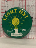 Light on since 1910  Button Pinback