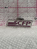 SCFP Au Coeur de l'action  Lapel Pin