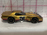 Gold Corvette Racer 2012 M35 Hot Wheels Diecast Car