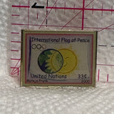 International Flag of Peace 2000 Stamp  Lapel Pin