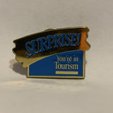 Surprise You're in Tourism Lapel Hat Pin