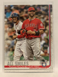 #295 All Smiles Pujols Holds Betts at First 2019 Topps Series One Baseball Card