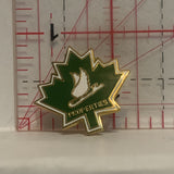 Properties Winged Skate Blade Green Maple Leaf Lapel Hat Pin