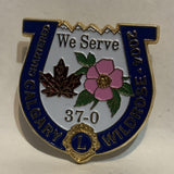 Lions Club Calgary Wild Rose 2004 37-0 We Serve Horse Shoe Lapel Hat Pin