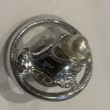 Hand Holding a Pearl Lapel Hat Pin AR
