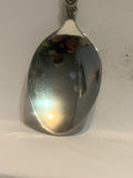 Sledding Couple Souvenir Spoon